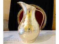 Dazzling wine jug, nickel silver.