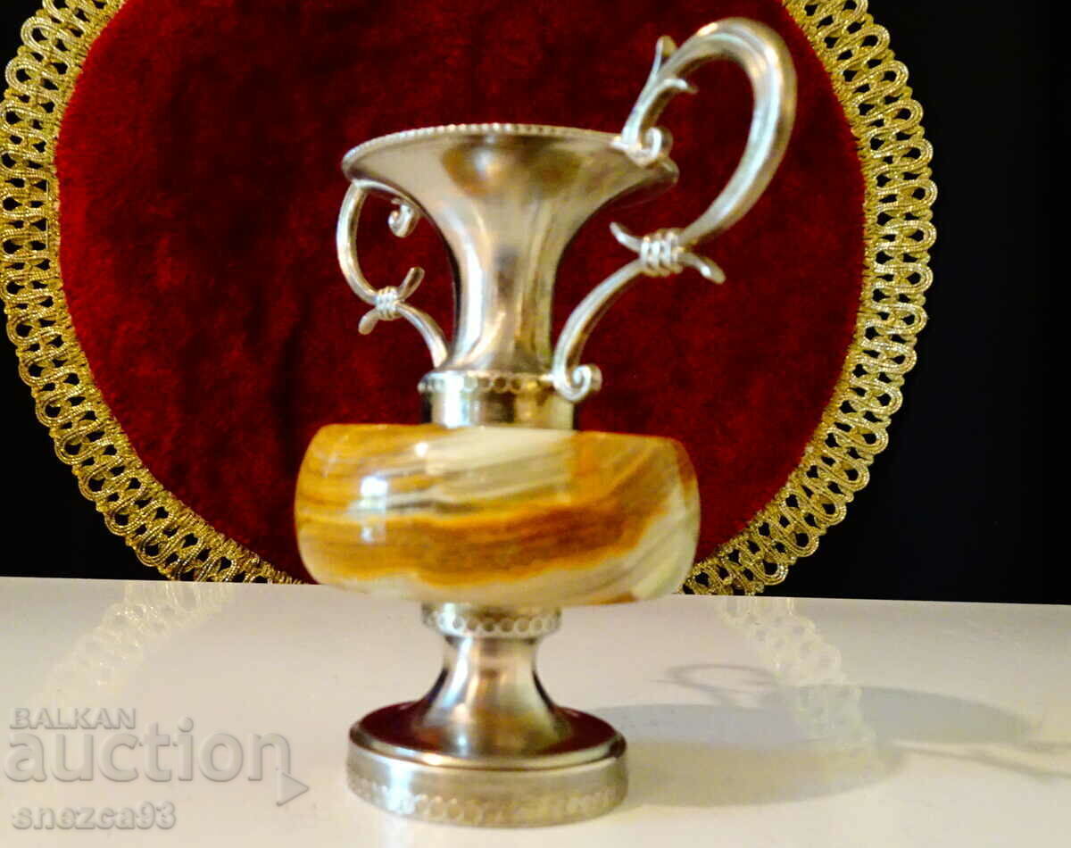 Auction Silver plated onyx vase. Auction Silver plated onyx vase.