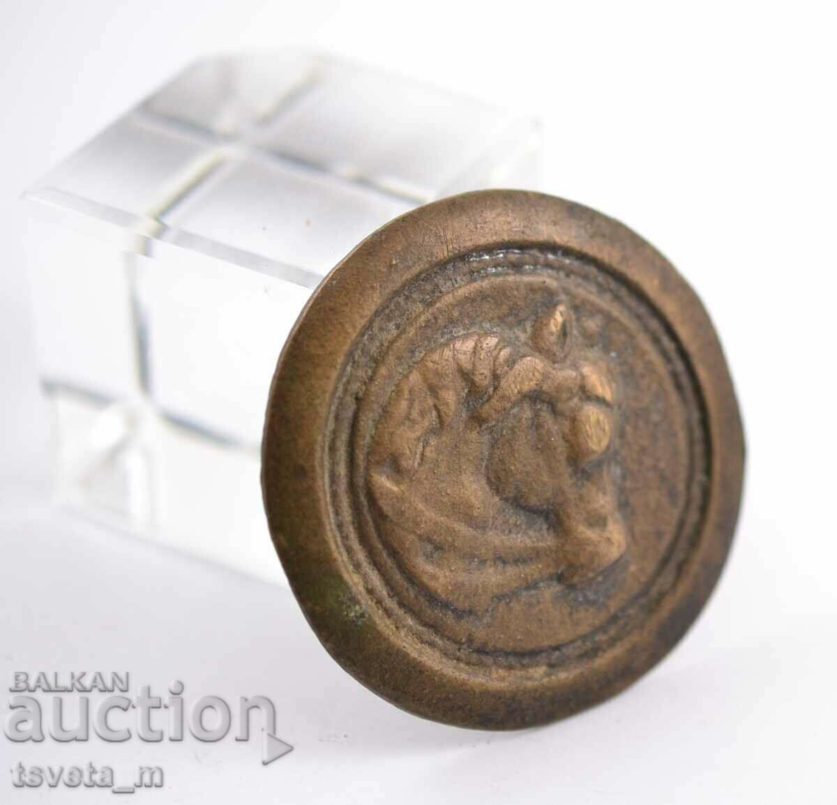 Auction Part of a horse's bridle, buckle with a horse's head, bronze Auction Part of a horse's bridle, buckle with a horse's head, bronze