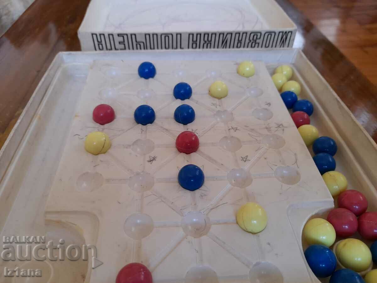 Delivery of Old puzzle game marbles