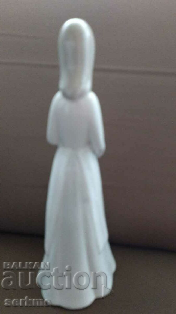 Auction  Porcelain figure