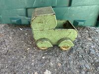 Old metal toy model baby carriage doll