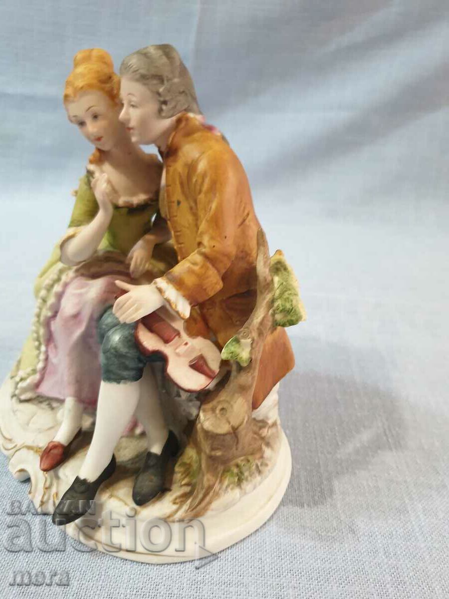 Auction  Porcelain composition of two lovers