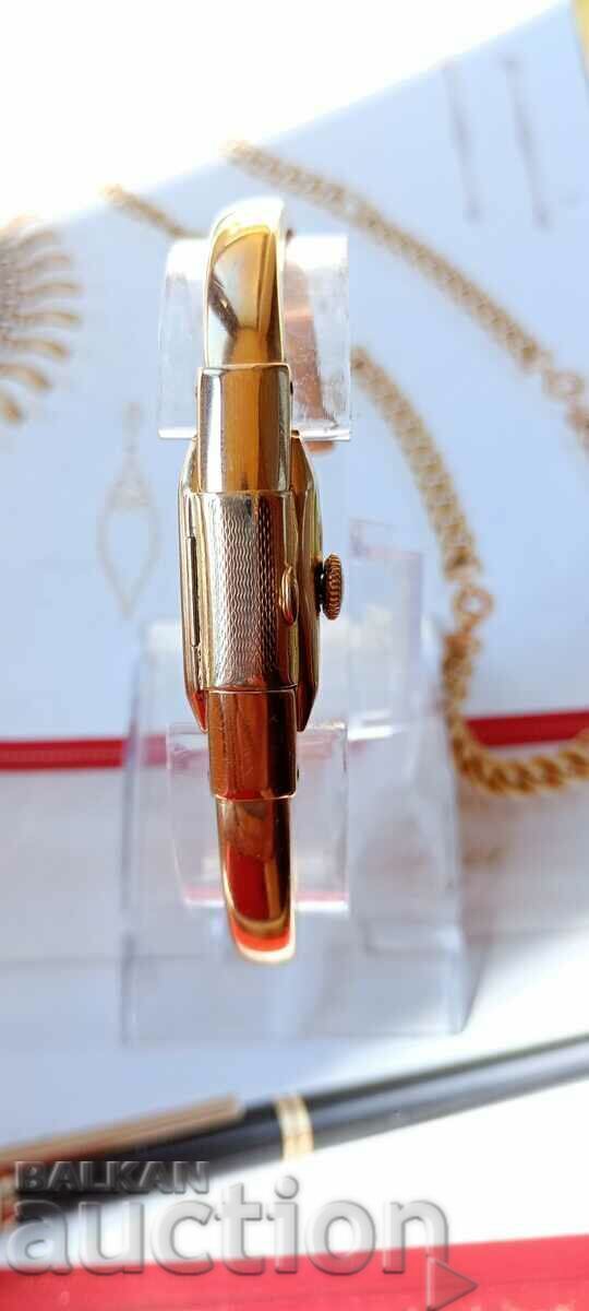 Auction  Gold women's watch CAUNY - 18k bracelet - 1960