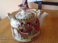 a beautiful Chinese teapot, richly decorated