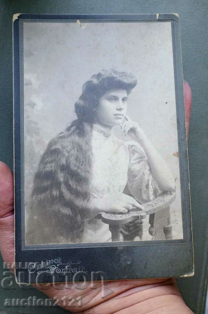 Photograph of a woman with very long hair