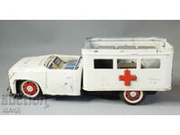 Old metal sheet metal toy model truck ambulance