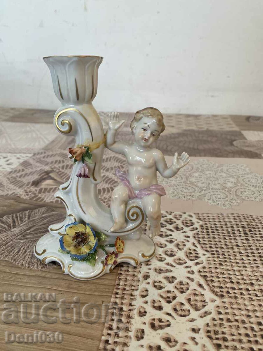 A beautiful porcelain candlestick with markings