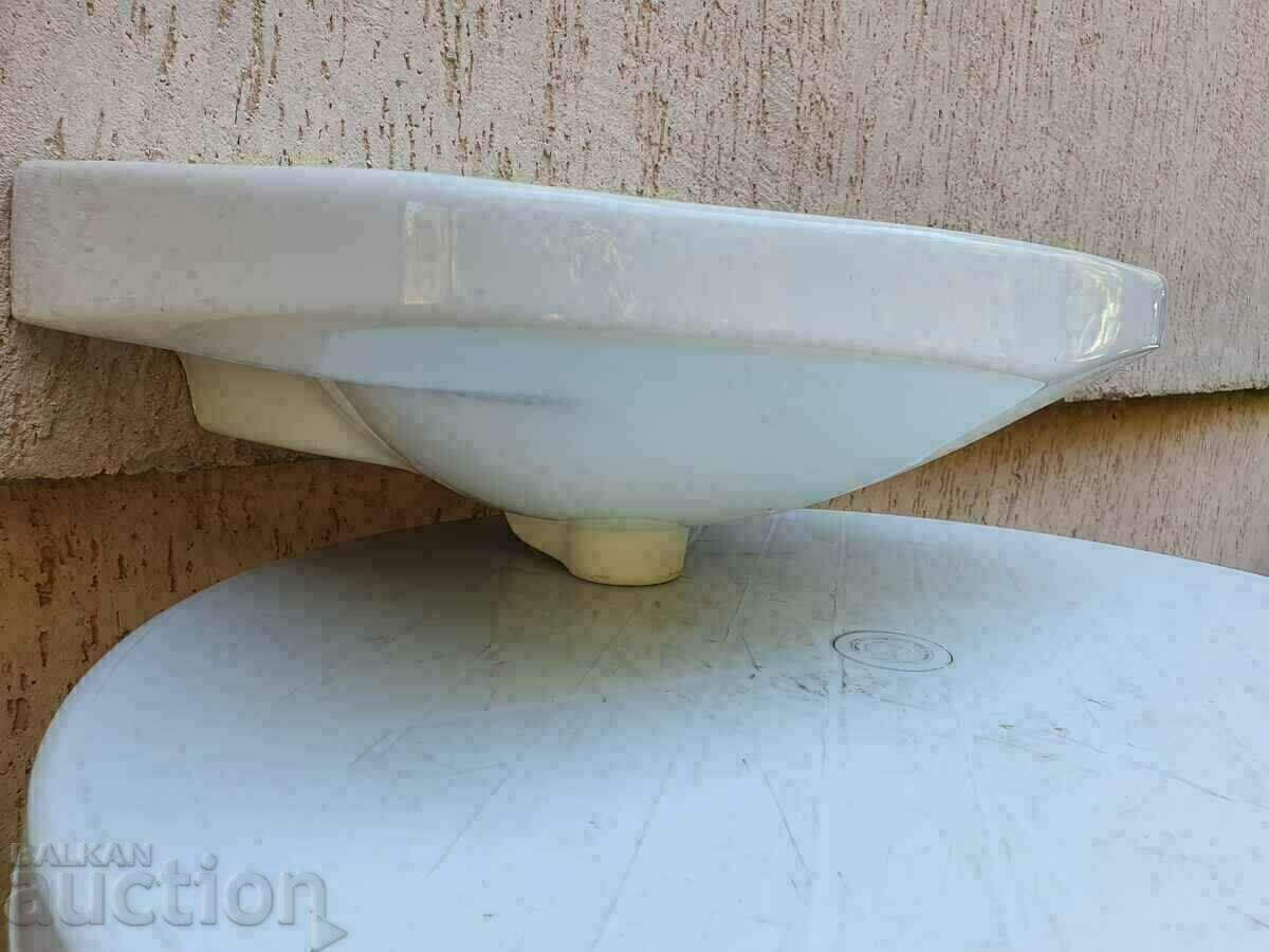 2. I am selling a new bathroom sink plus siphon. BZC - 7 2. I am selling a new bathroom sink plus siphon. BZC - 7