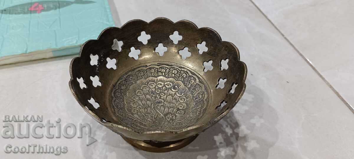 Engraved metal bowl