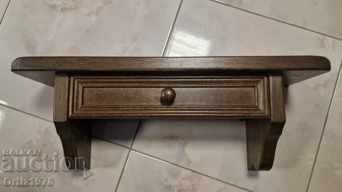 Solid oak bookcase with drawer.