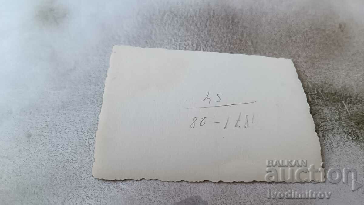 Photo Sofia Man in front of BEBCHE store with price 2.45 BGN | € 1.25 Photo Sofia Man in front of BEBCHE store with price 2.45 BGN | € 1.25