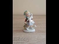 Old porcelain figurine figurine