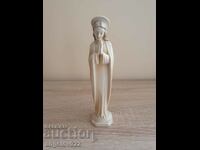 Old porcelain figurine figurine