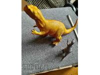 Two rubber dinosaur toys