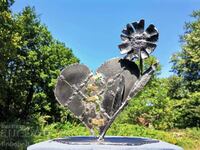 Sculpture in the style of scrap metal art