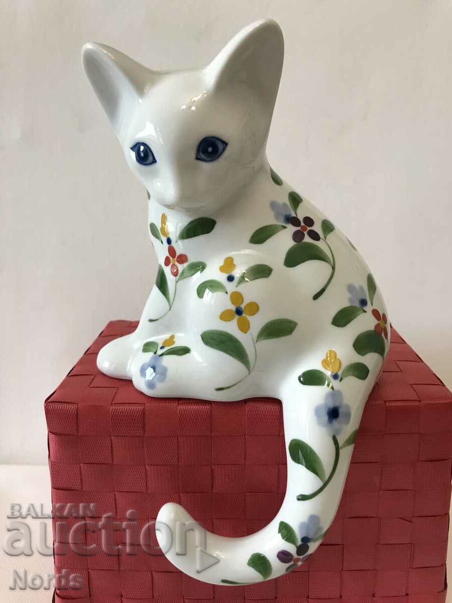 A beautiful porcelain kitten