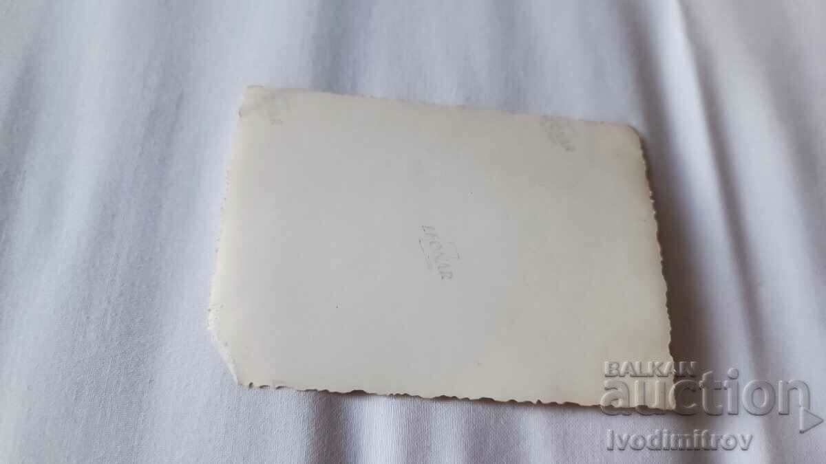 Photo Man and women in front of a war memorial with price 2.35 BGN | € 1.20 Photo Man and women in front of a war memorial with price 2.35 BGN | € 1.20