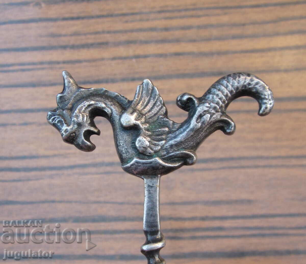 Auction  antique silver plated corkscrew with seahorse figure