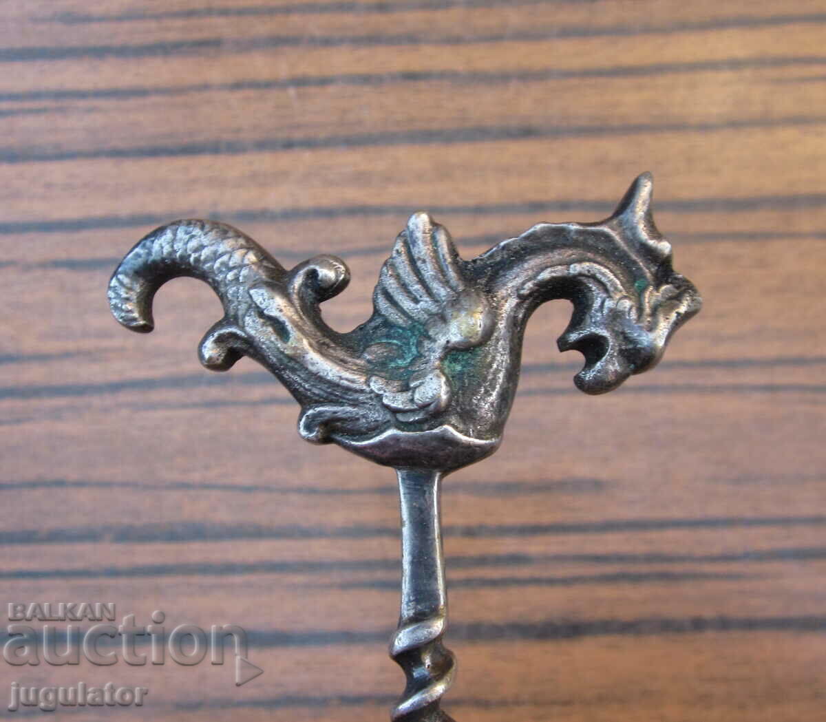 Delivery of antique silver plated corkscrew with seahorse figure