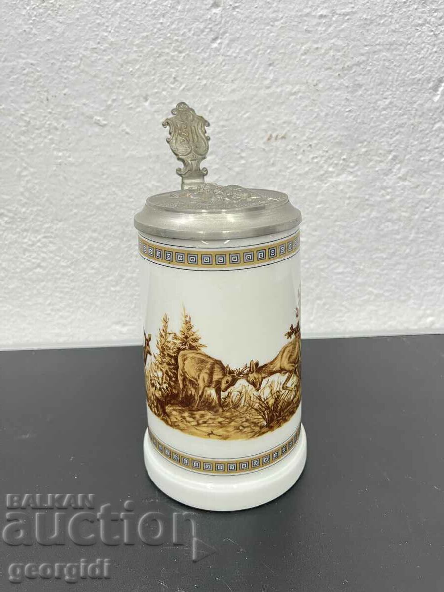 Porcelain mug with hunting scene and pewter lid. #5878