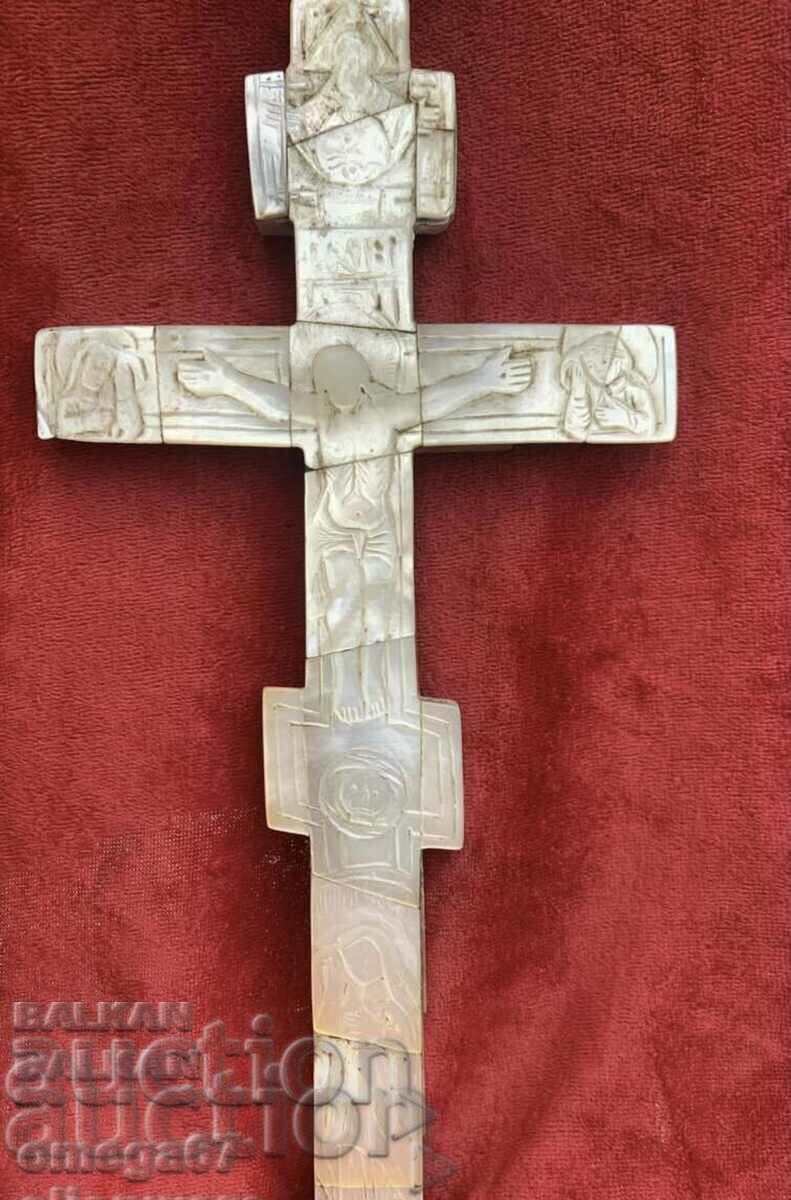 A large mother-of-pearl cross from the 19th century.