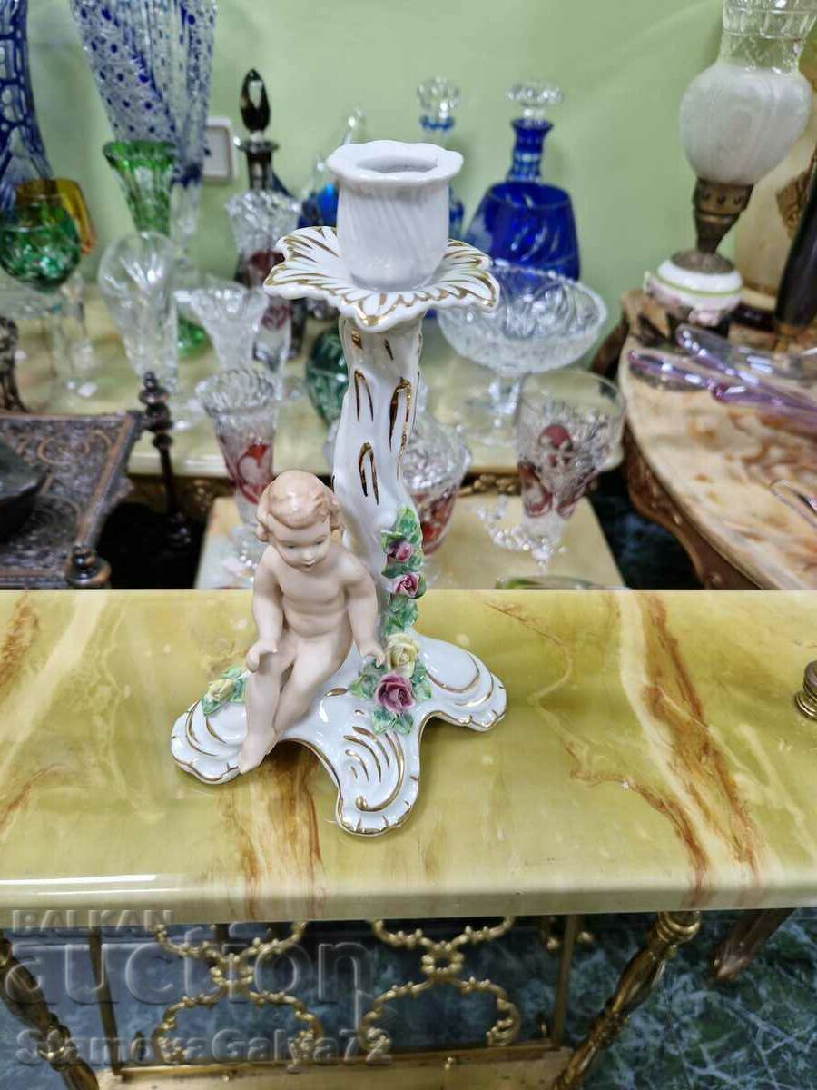Auction  A great antique Dresden porcelain candle holder
