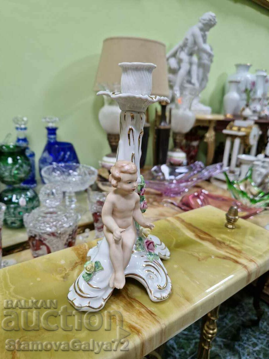 Delivery of A great antique Dresden porcelain candle holder