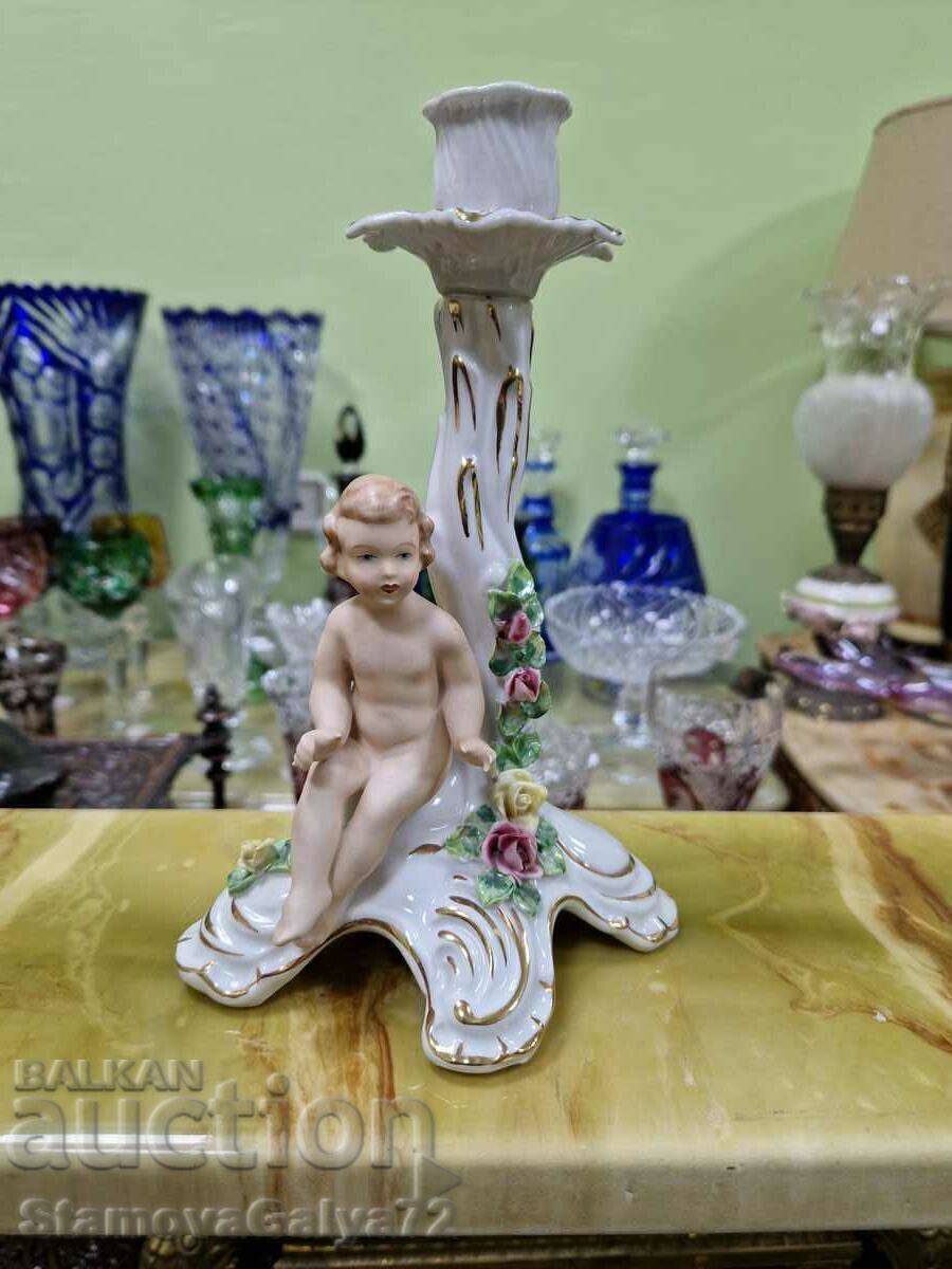 A great antique Dresden porcelain candle holder