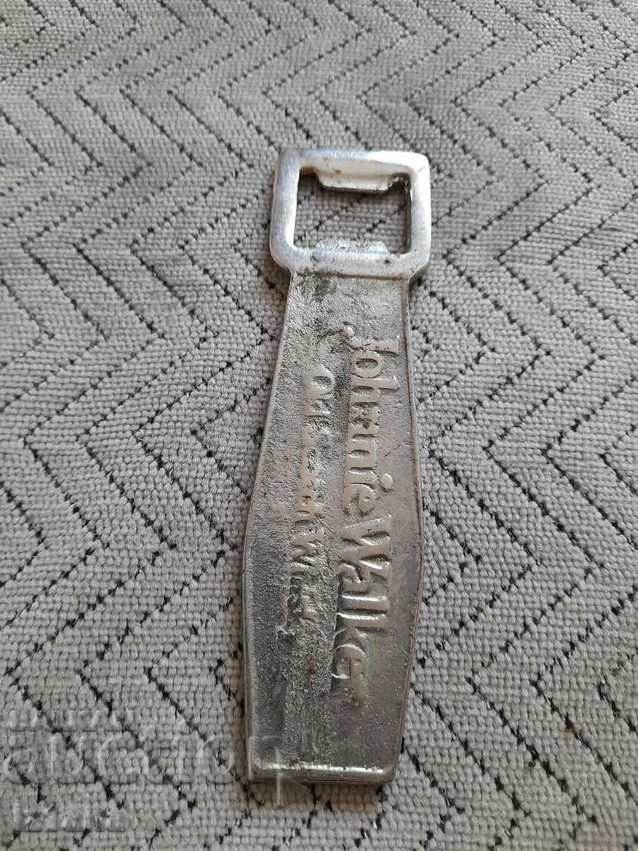 Delivery of An old Johnnie Walker bottle opener Delivery of An old Johnnie Walker bottle opener