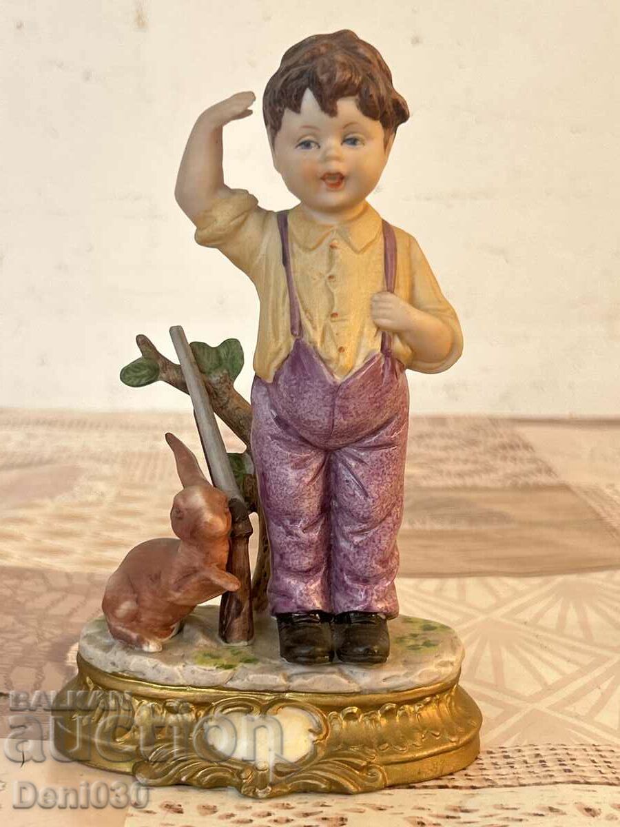 A beautiful bisque porcelain marked figure