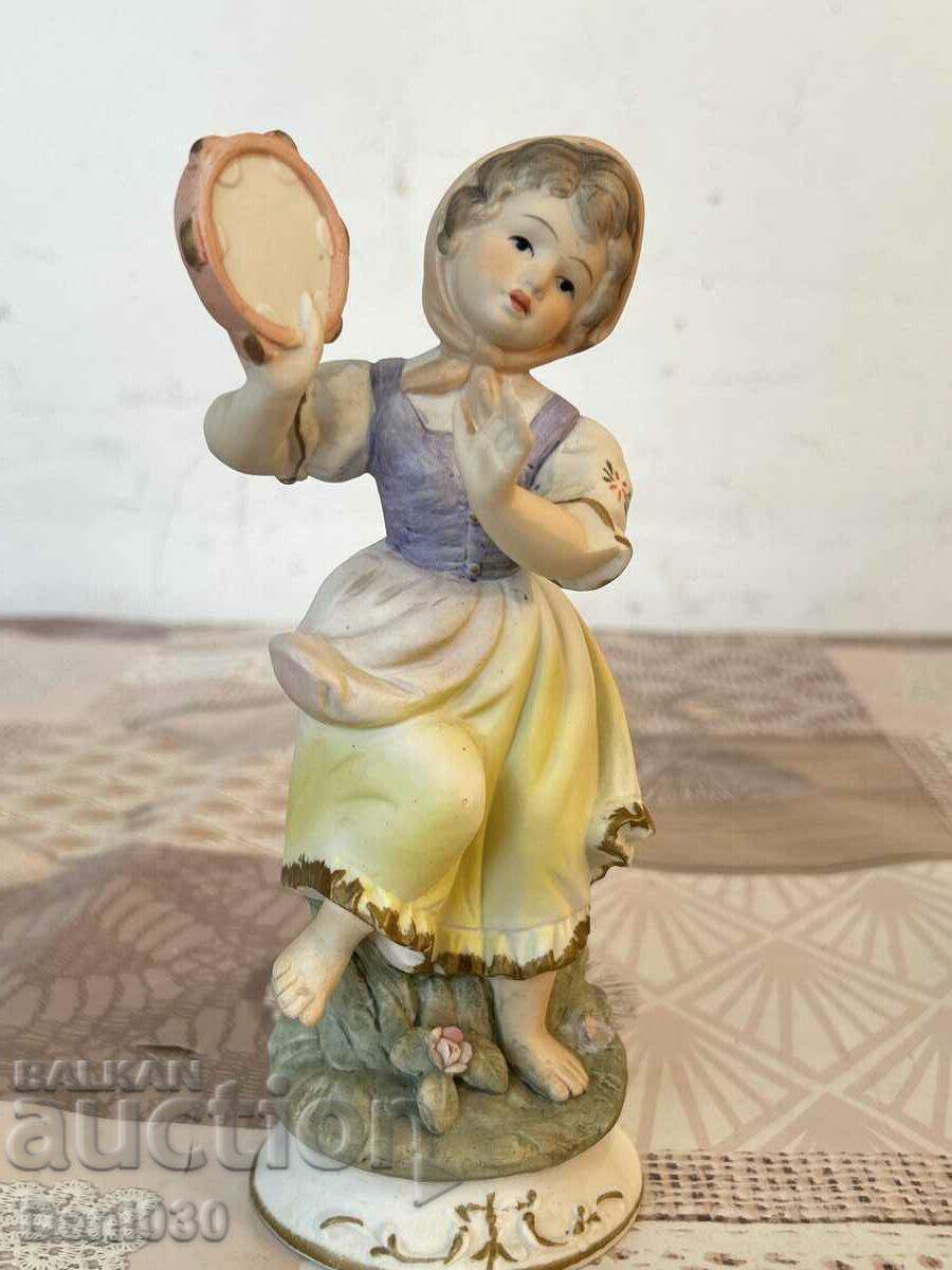 A beautiful biscuit porcelain figure