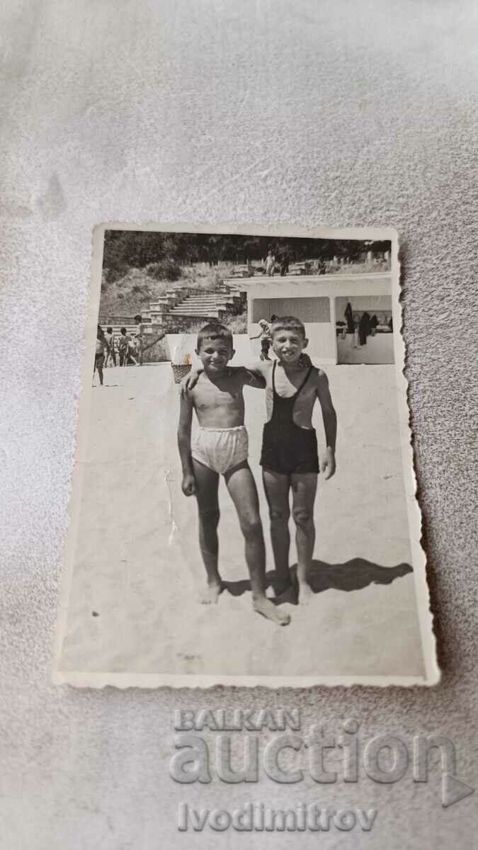 Photo Stalin Two boys in retro swimsuits on the beach 1953