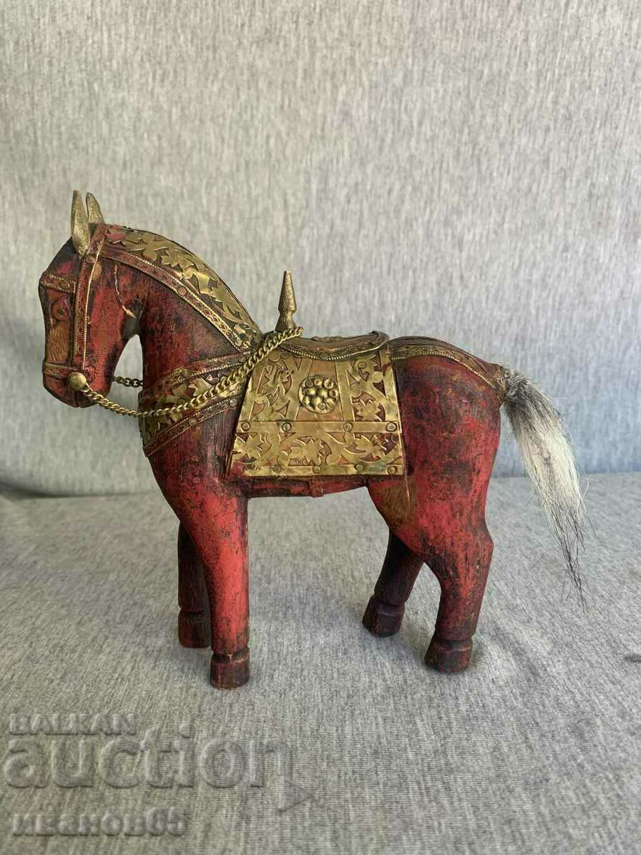 wooden horse with copper lining