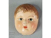 Old doll face toy