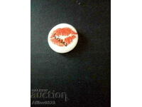 Kisses badge.