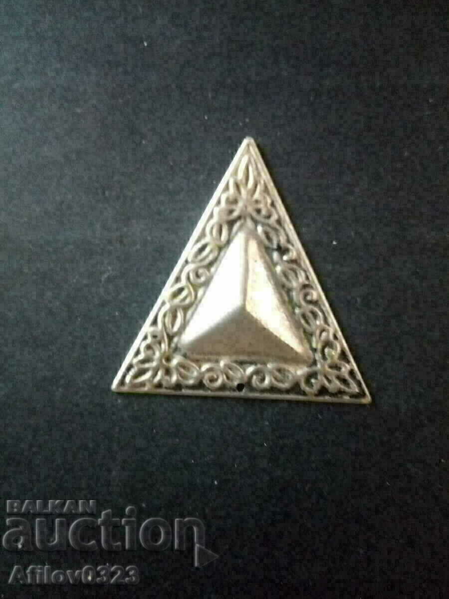 Triangle sign ornament.