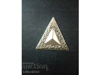 Triangle sign ornament.