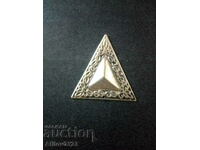 Triangle sign ornament.