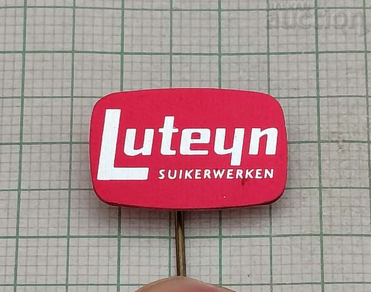 LUTEYN FOOD ADVERTISING BADGE .