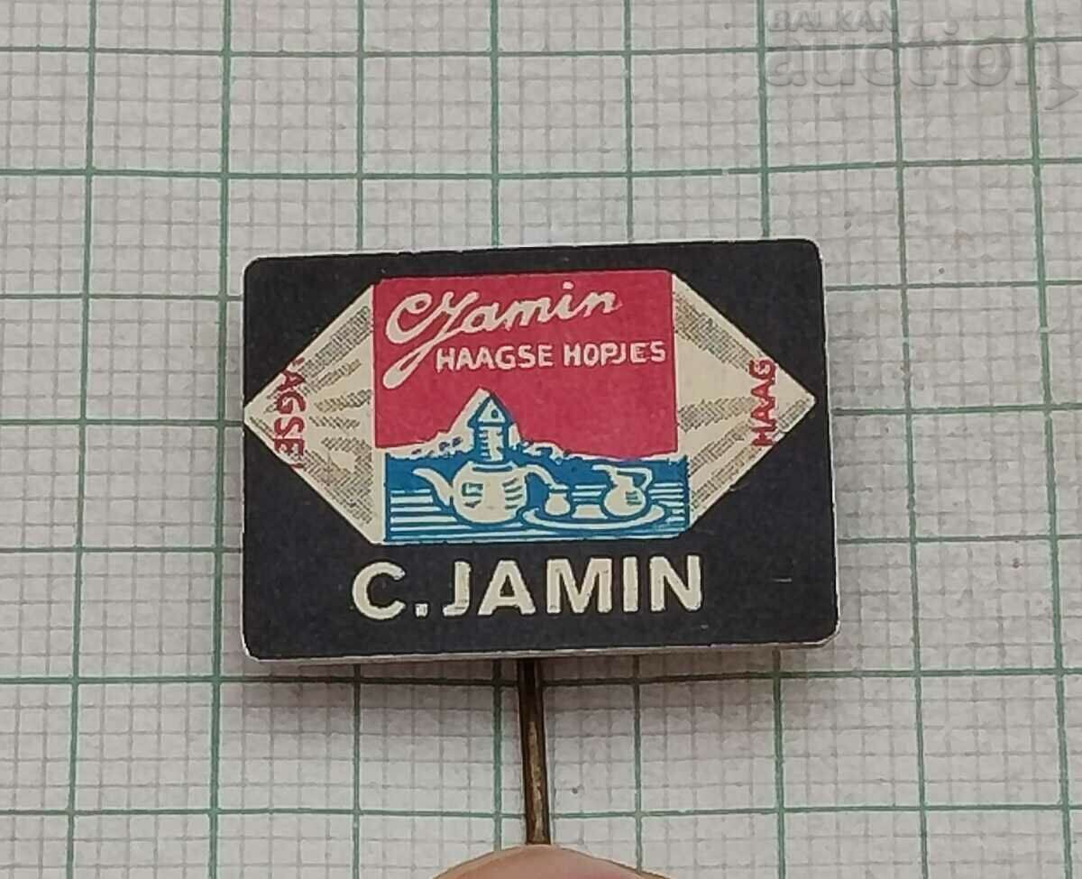 C. JAMIN ADVERTISING BADGE