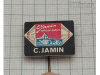 C. JAMIN ADVERTISING BADGE