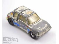 Autoturism metalic CUTĂ de chibrite PEUGEOT 205 TURBO 1984 MACAU