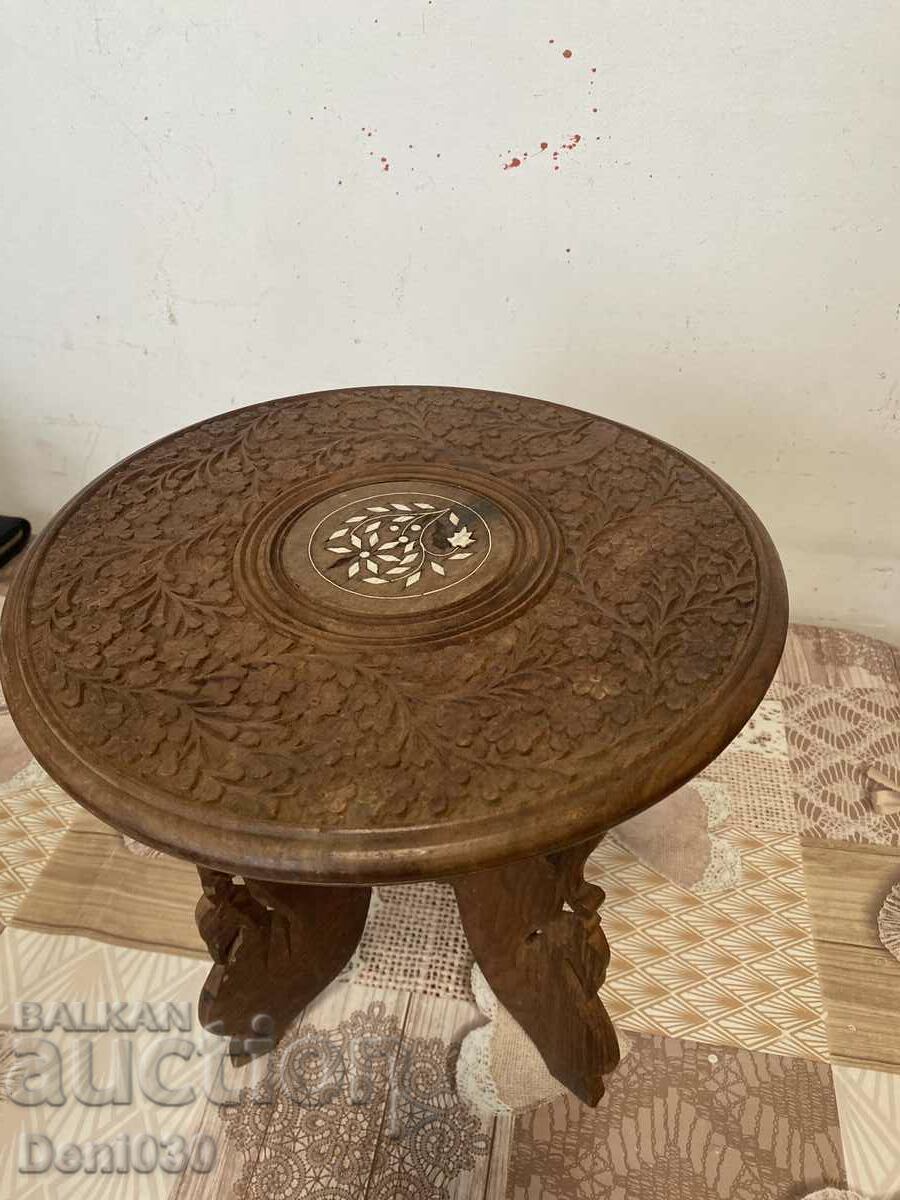 A beautiful wooden hand-carved Indian side table