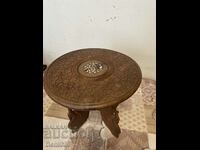 A beautiful wooden hand-carved Indian side table