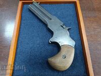 Derringer, un pistol