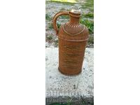 Old wicker bottle