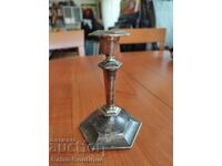 Old metal candlestick, height 18 cm.