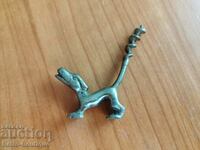 Old corkscrew, dog