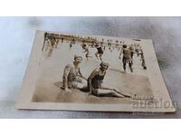 Photo Two young girls sitting on the seashore 1930